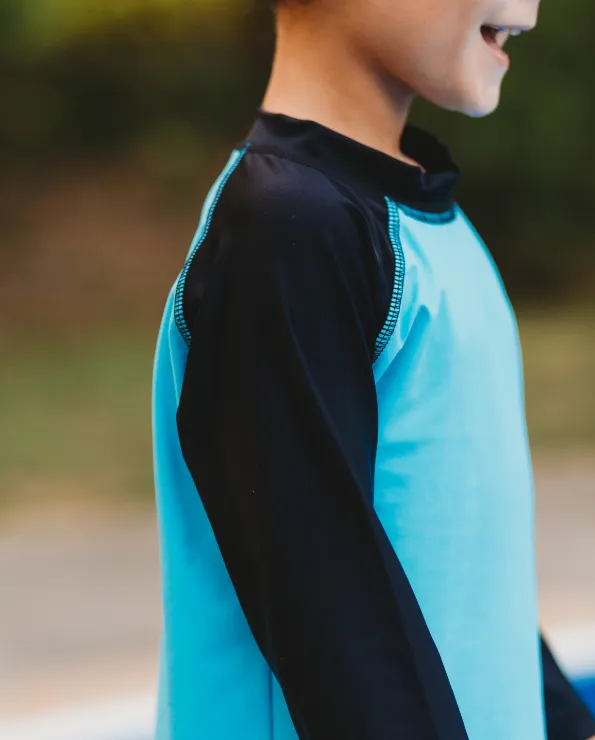Boys UPF 50  Color Block Solid Long Sleeve Rashguard | White with Royal